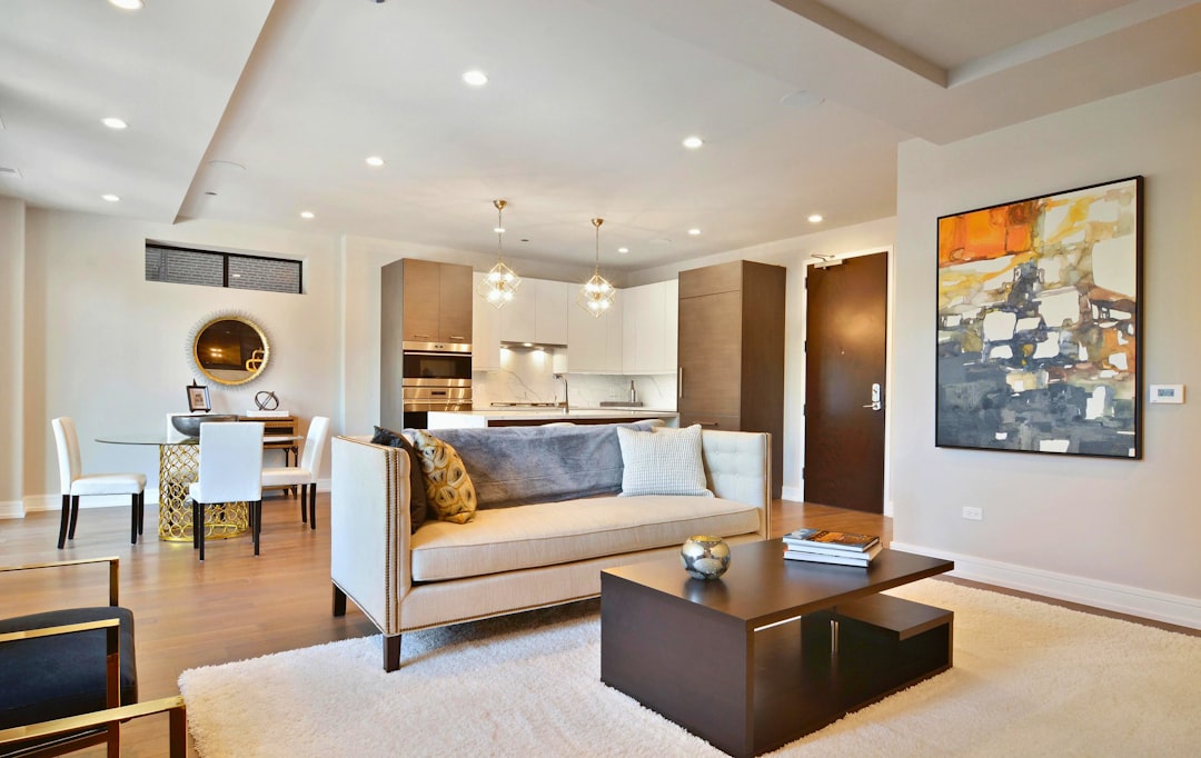 Modern, stylish living room with open concept kitchen